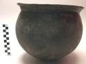 Pottery cooking pot, black, large incised decoration beneath rim (mbikasamakubi)