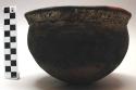Pottery eating pot - charred, stipple pattern around rim (kibindi)