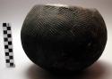 Globular pot, textile (?) marked