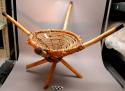 Chair, cone shaped basket attached to 4 sticks by fibre coiling (mbatasameri)