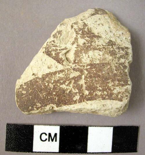 Ceramic body sherd, white with brown painted geometric design
