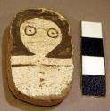 Worked sherd showing face