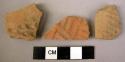 3 potsherds - red, stamped