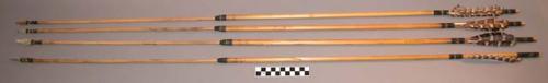 Stone pointed feather tipped arrows with round foreshafts (8)