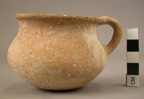 Small handled pottery cup