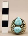 Ring, silver, 2 triangular turquoise stones in decorative setting