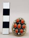 Ring, silver, 7 small coral stones set in a oval with silver beads between