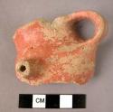 Handled potsherd - red slip, burnished