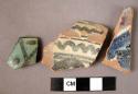 Ceramic rim and body sherds, green, blue and cream glazed, highly decorated