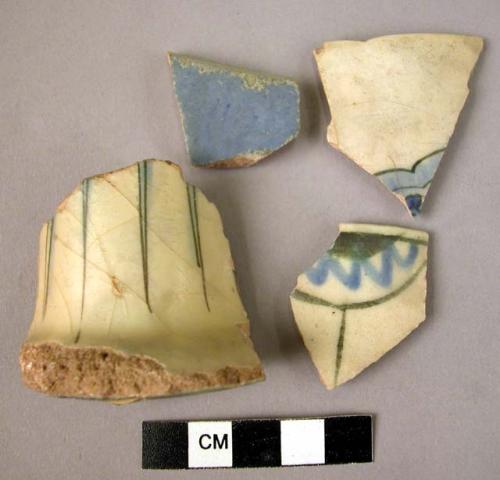 4 rim potsherds - blue and white glaze