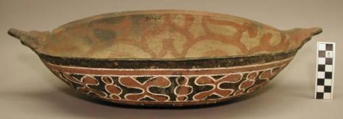 Earthenware dish with cord-impressed and polychrome designs on exterior and polychrome designs on interior
