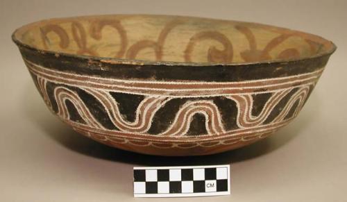 Earthenware bowl with cord-impressed and polychrome designs on exterior and polychrome designs on interior
