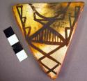 Triangular pottery tile