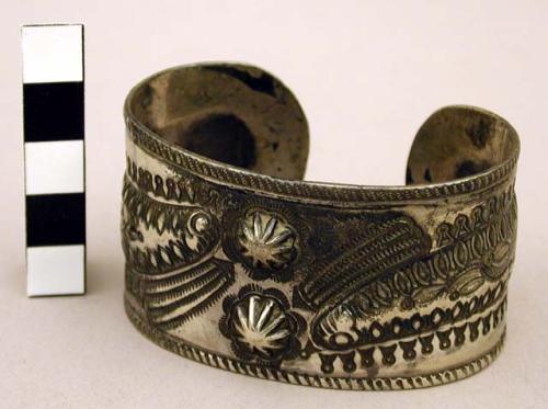 Silver cuff bracelet with stamped decoration