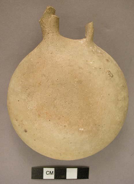 Small lentoid flask type pottery jar