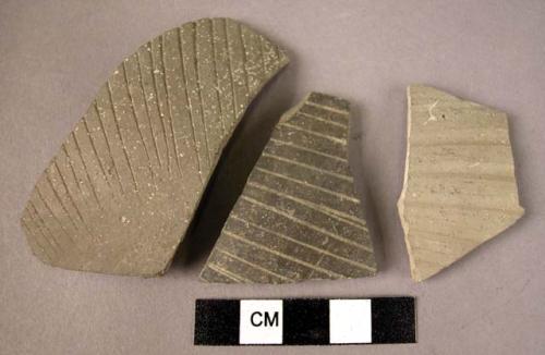 7 potsherds - Bucchero & gray