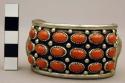 Cuff bracelet, solid silver band inlaid with small oval coral stones