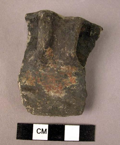 Handled potsherd - thick black slip, burnished