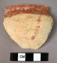 Rim potsherd - with inside slip running over rim