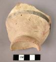 Ceramic jar ring base sherd, buff slipped red ware with black painted band