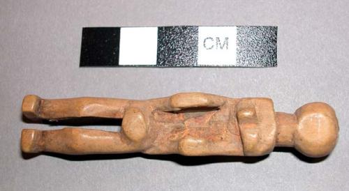 Female wooden figurine, in witch doctor's basket 39-64-50/3459.