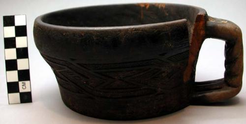 Wooden cup, incised ornament