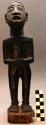 Figurine, carved wood, human figure, black pigment, incised facial features