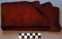 Girdle of bark cloth, stained red