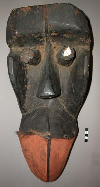 Black wooden mask (Lu bo bie) - "Elephant pulls up trees."  Settles palaver betw