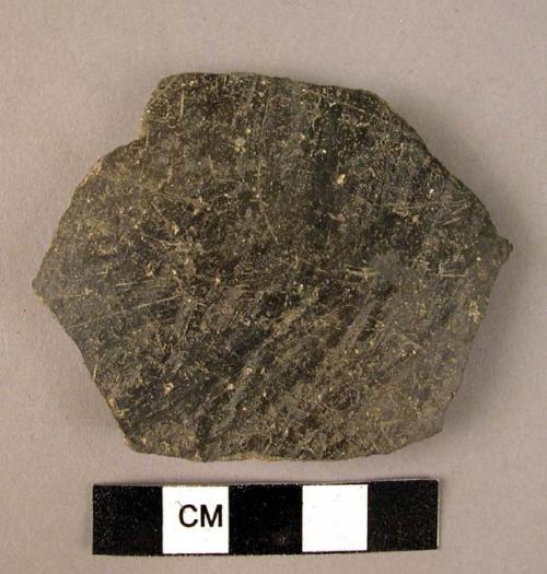 Ceramic body sherd, black burnished exterior, coarse interior