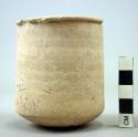 Ceramic partial cup, undecorated buff ware, wheel made