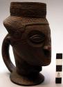 Cup - carved human head