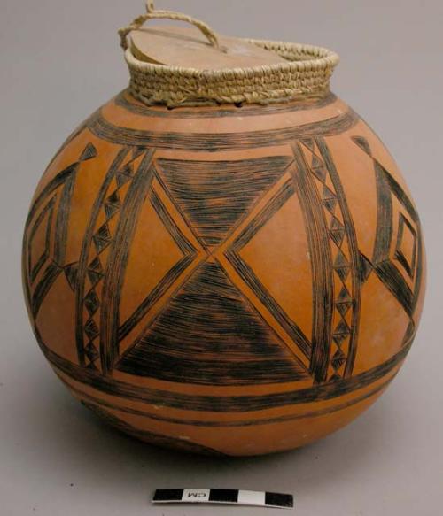 Gourd covered jar