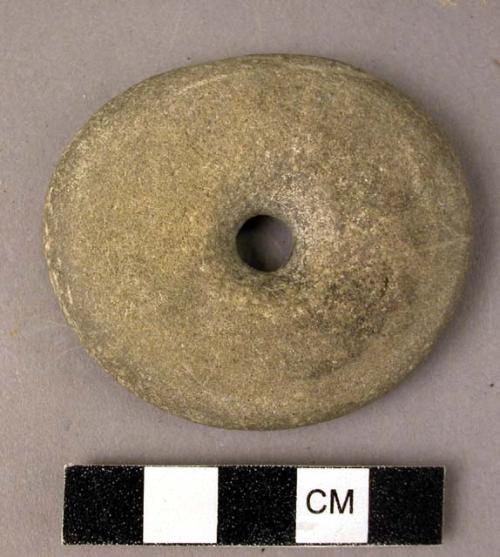 Perforated stone disk