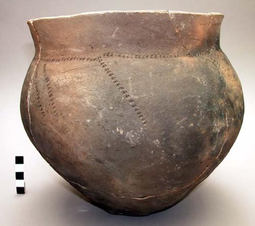 Pottery vessel - broken, stabbed decoration