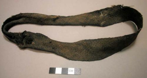 Strip of bark fiber worn about neck of stone idol, no. 50/3054