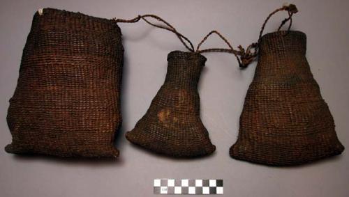 Fibre baskets - pouch-like, strung together on fibre cord ("intimberi")