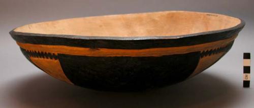 Family sized wooden bowl with black designs