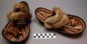Sandals, molded hide soles, incised & pig. insoles, fur straps, 1 skin toe strap