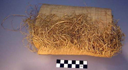 Arm bag of grass cloth in process of manufacture