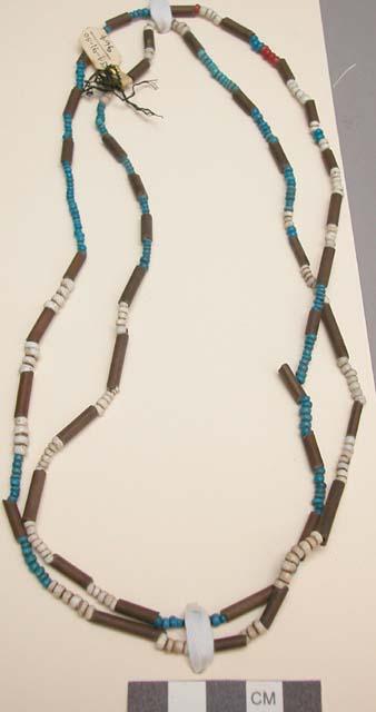 Necklace of black, blue and white beads