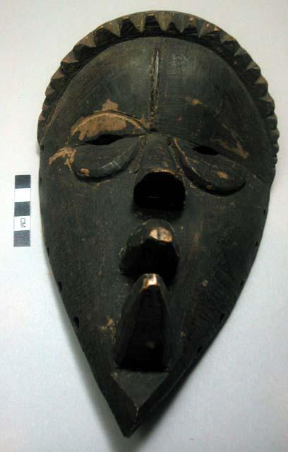 Wooden face mask.