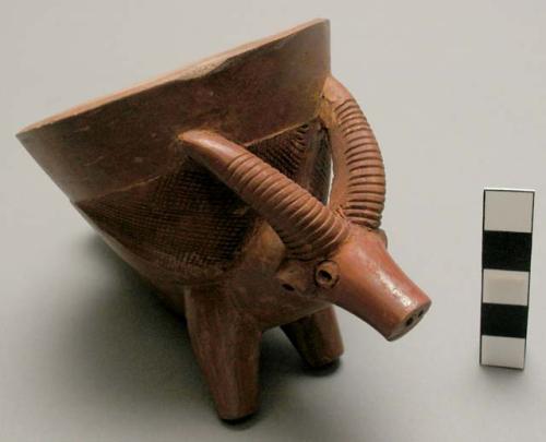 Red clay pipe bowls, decorated with animal figures - 4 antelope(?) 1 water buffa