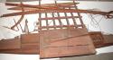 Model of large sailing canoe with 1 paddle, complete