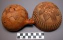 Gourd container, 1/2 sphere, hollowed, perforated near stem, burnt linear deco