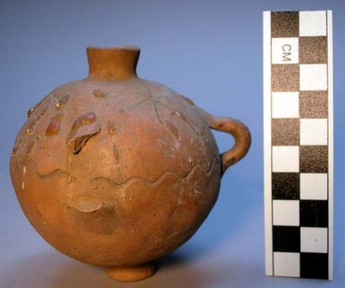 Ceramic jar, spherical, incised deco, 1 handle, pcs missing, narrow base/neck