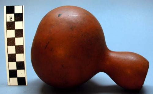 Small bottle-shaped gourd used for drinking pombe, nkoge