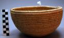 Basketry bowl, coiled veg fiber, dense weave, hemispherical