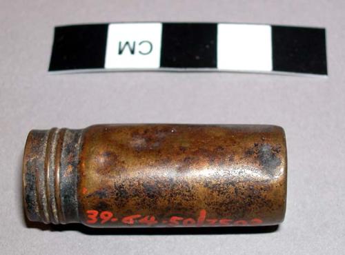 Empty cartridge shell, in witch doctor's basket 39-64-50/3459.