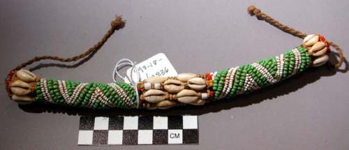 Armband with beadwork and cowrie shells